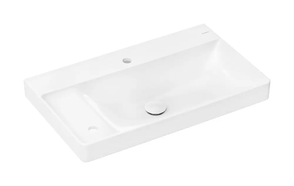 Helles Waschbecken von Hansgrohe mit integriertem Ablagebereich auf der linken Seite und zwei Hahnlöchern, ohne Überlauf, in klarer, schlichter Form.
